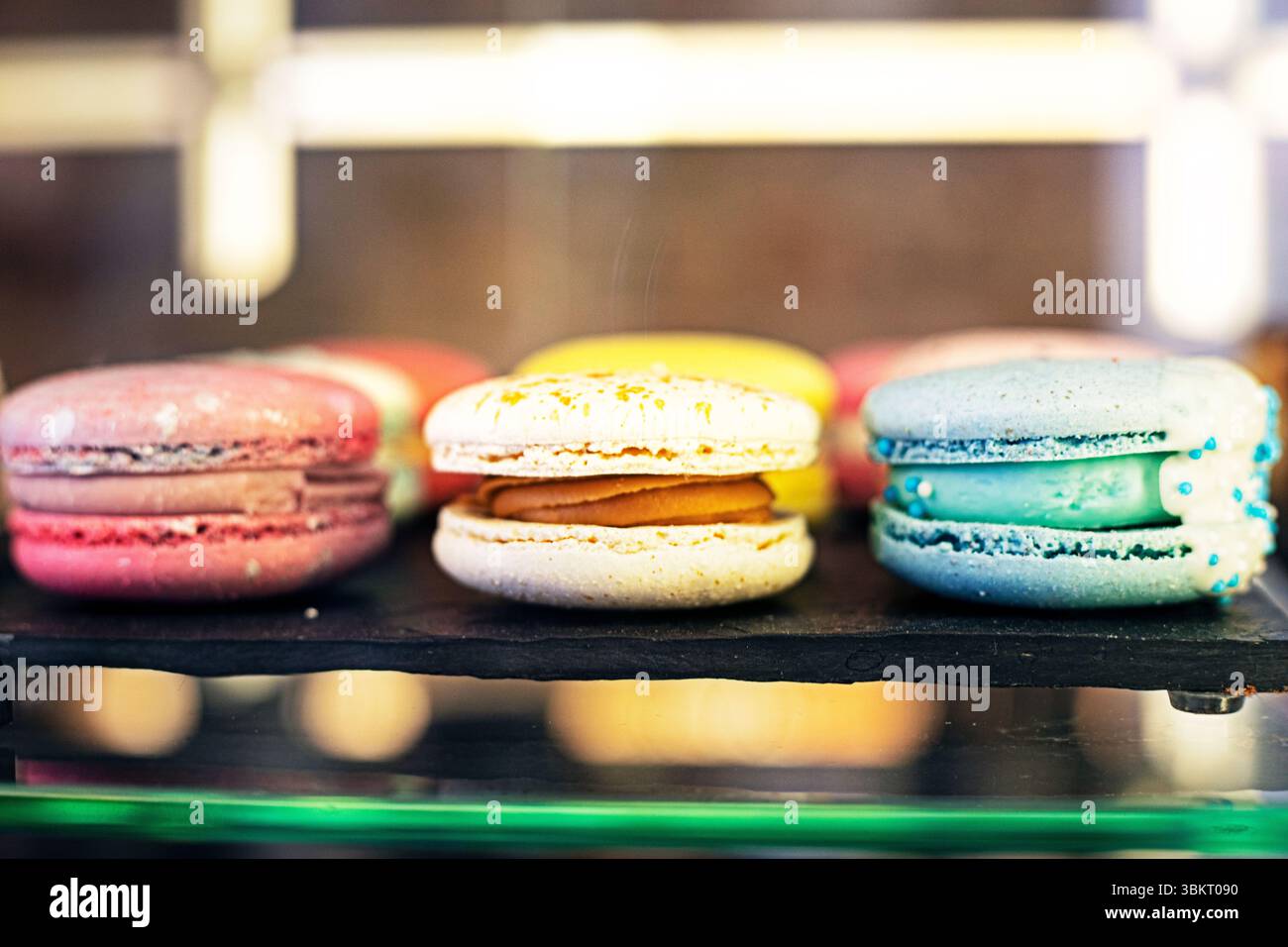 multicolored macaroons on the counter in a coffe shop Stock Photo