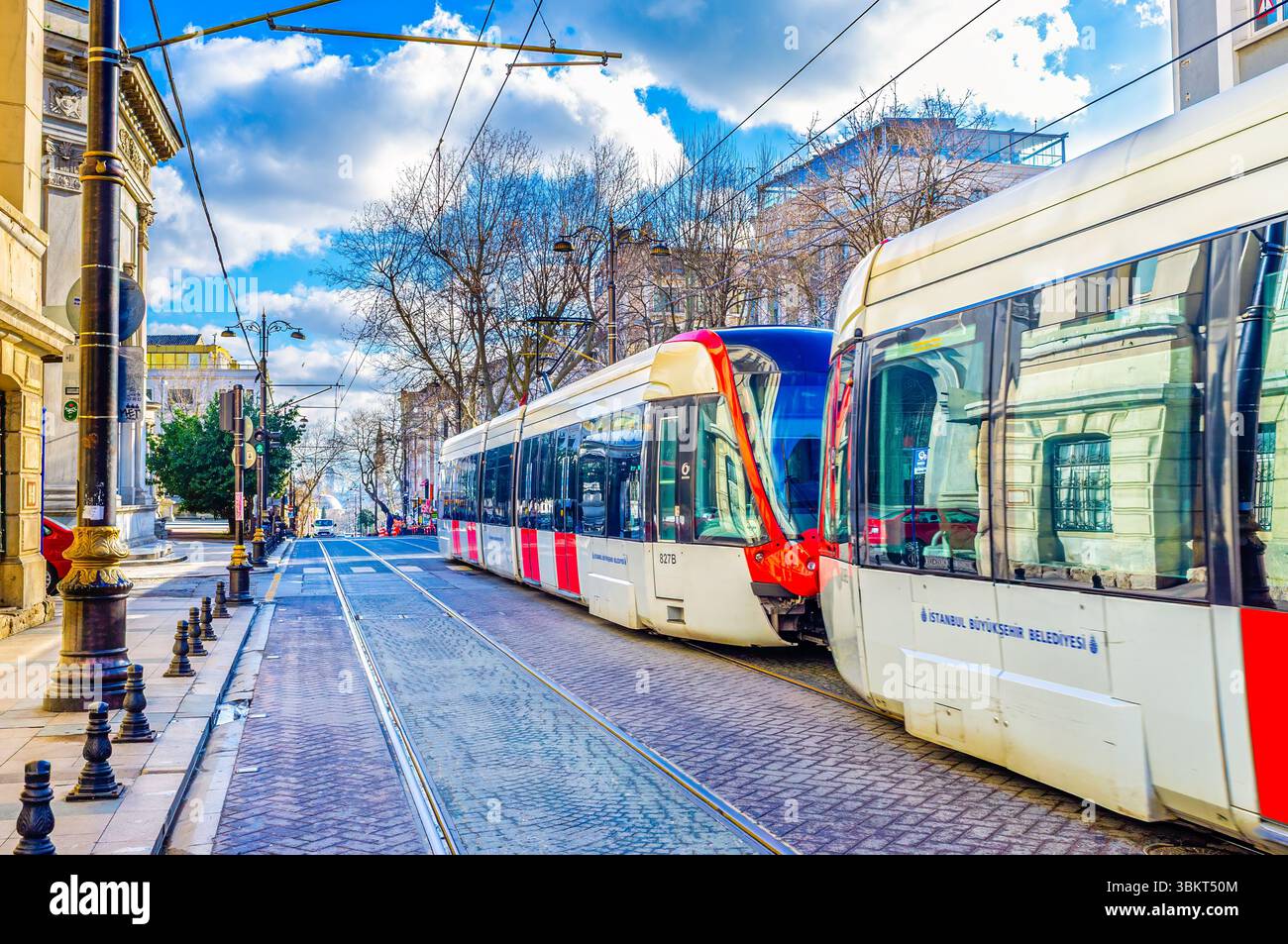 ISTANBUL, TURKEY - JANUARY 13, 2015: Modern tram rides along Divan Yolu street, on January 13 in Istanbul, Turkey Stock Photo