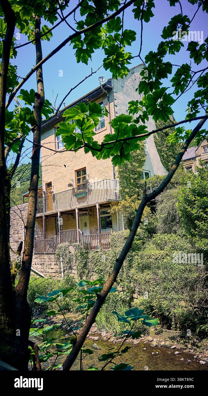 Tall house above the River Calder at Hebden Bridge,UK Stock Photo - Alamy