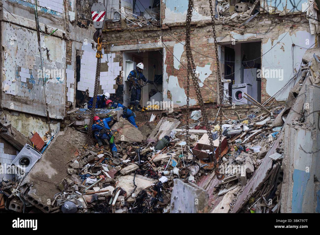 Kyiv apartment building rubble rescue Energy and Civilian Infrastructure Under Siege