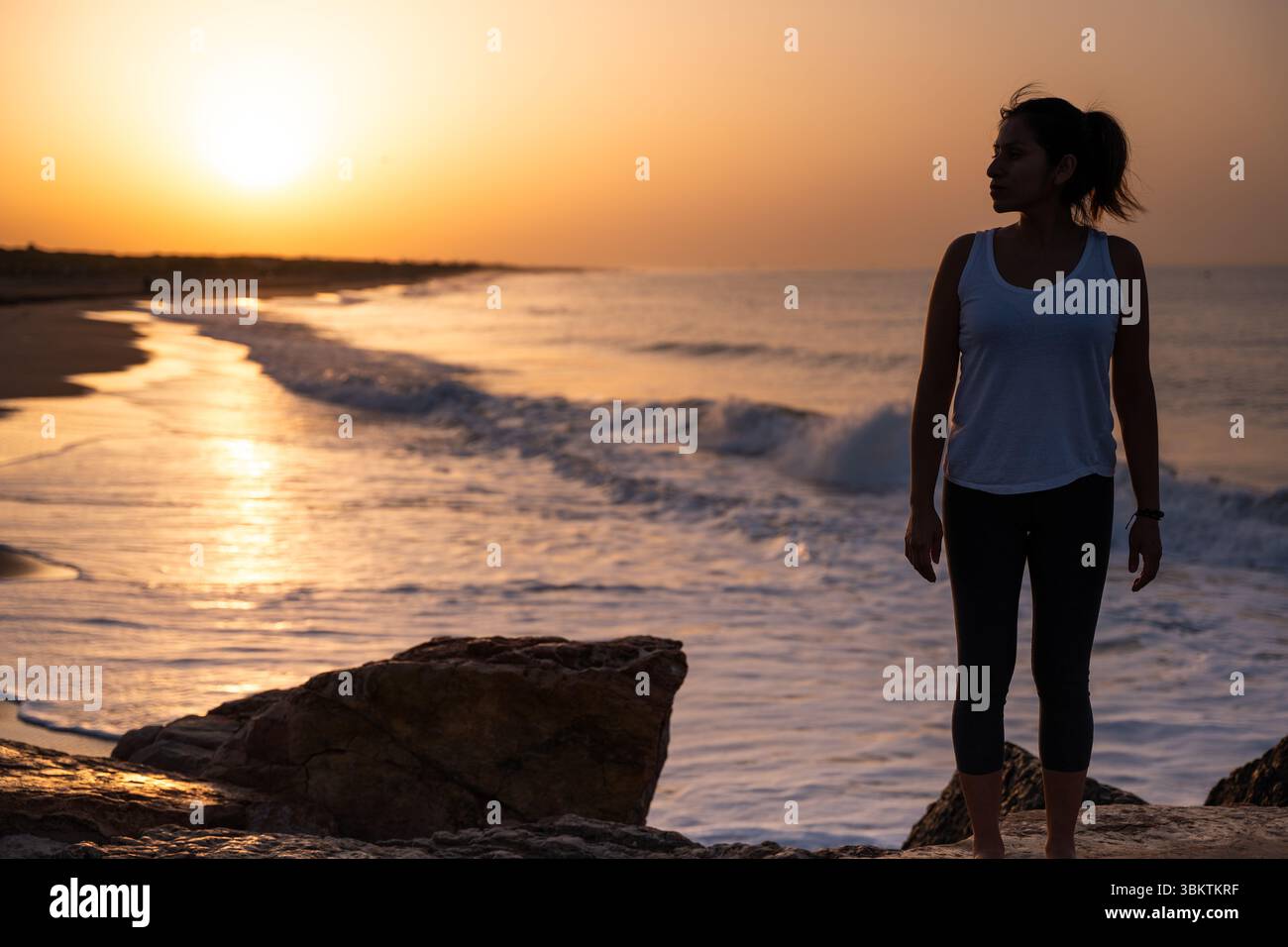 Silhouette woman standing shore hi-res stock photography and images - Alamy