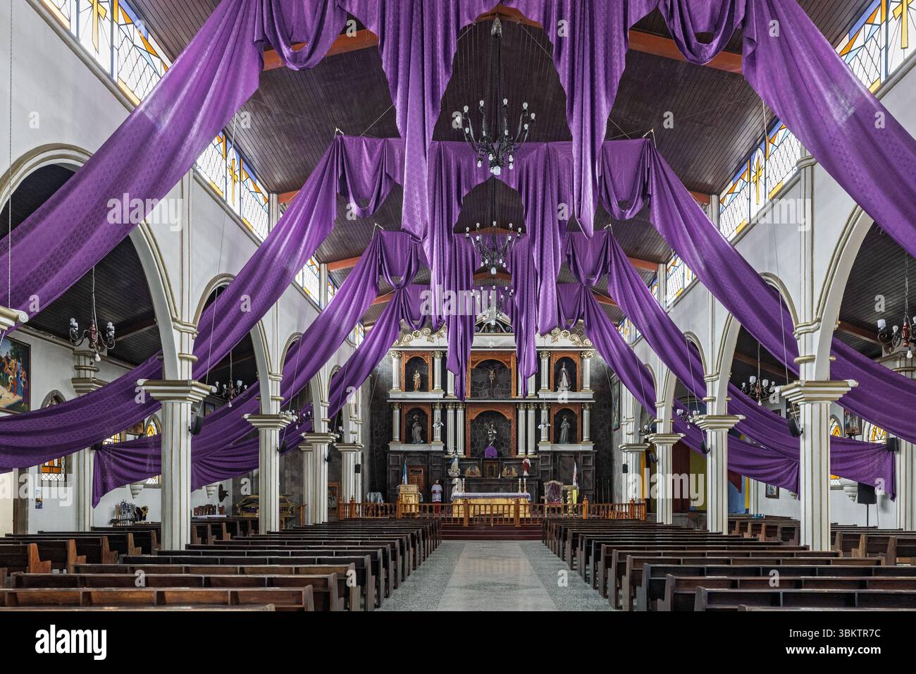 Catholic Church with purple hanings for lent, San Juan La Laguna, Lake Atitlan, Solola Department, Guatemala Stock Photo