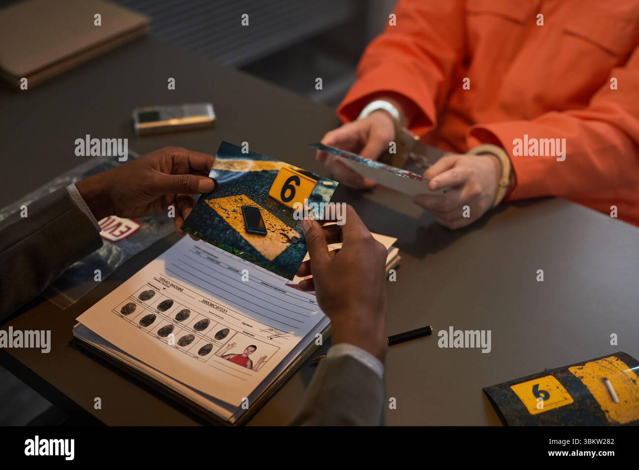 Evidence Box Interrogation Lawyer showing evidence photo hi-res stock photography and images - Alamy
