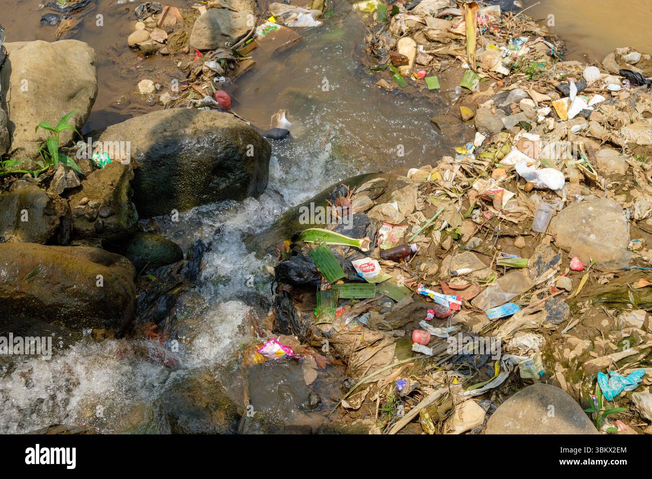 Gallery Detail: Plastic Bottles Bags And Trash Choke A Stream Illustrating Severe