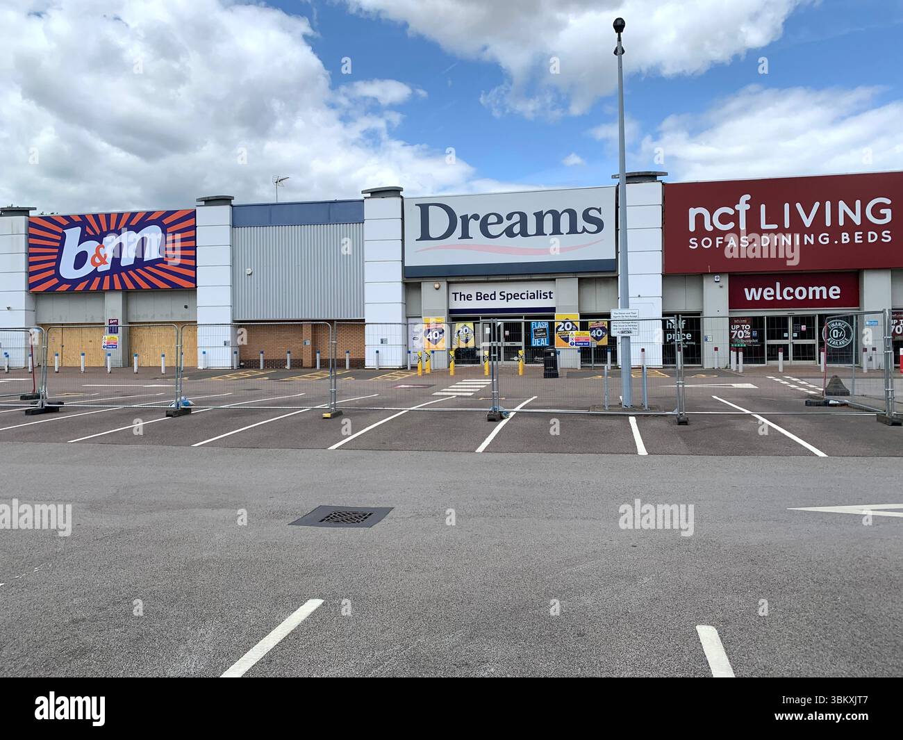 fire in Northampton England UK British Arson ruined shops shop  NCF Sofas Beds Dunelm town burnt down animals pets ruined beds fire lost shops - Smartphone Captured Stock Image