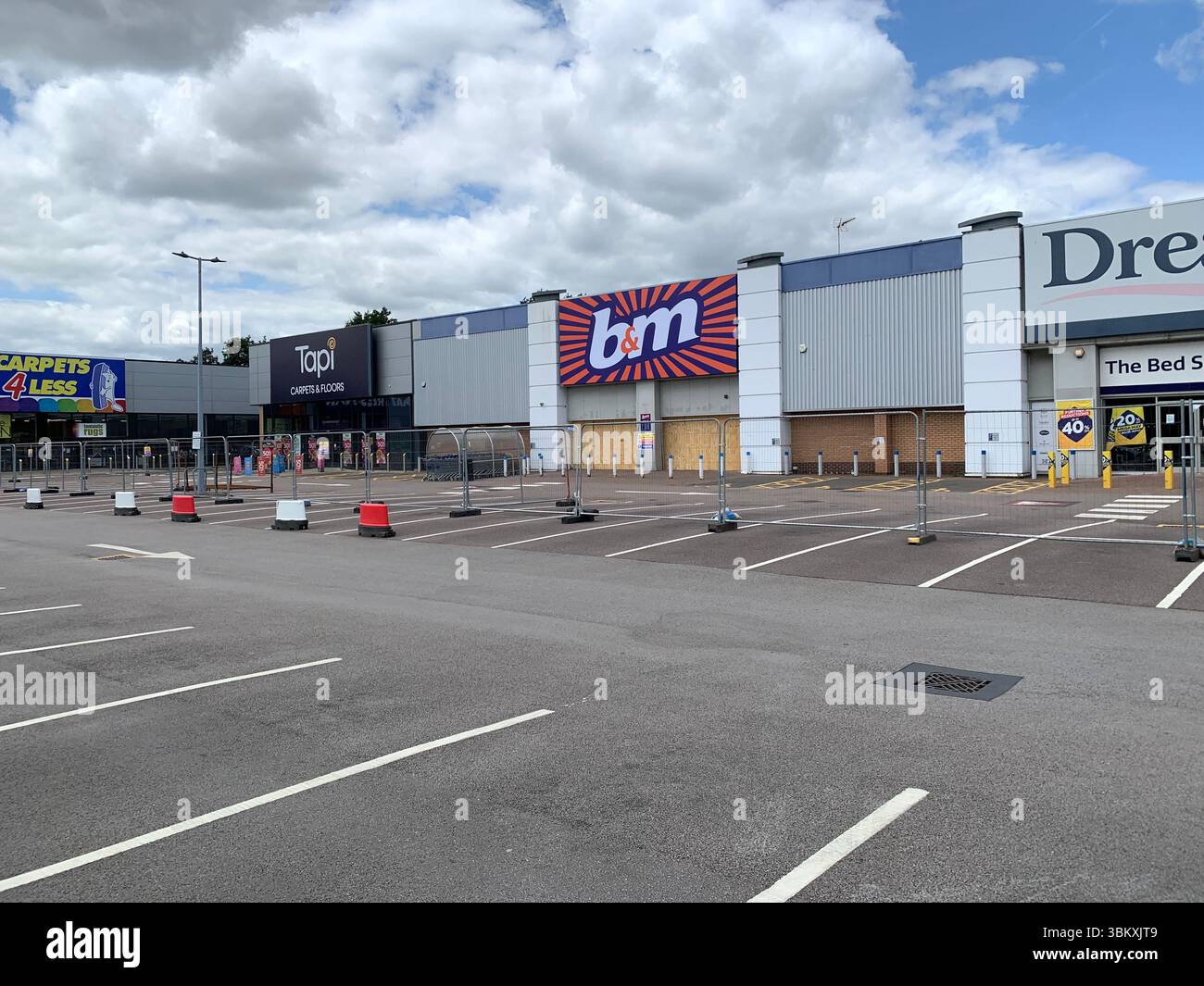 fire in Northampton England UK British Arson ruined shops shop  NCF Sofas Beds Dunelm town burnt down animals pets ruined beds fire lost shops - Smartphone Captured Stock Image