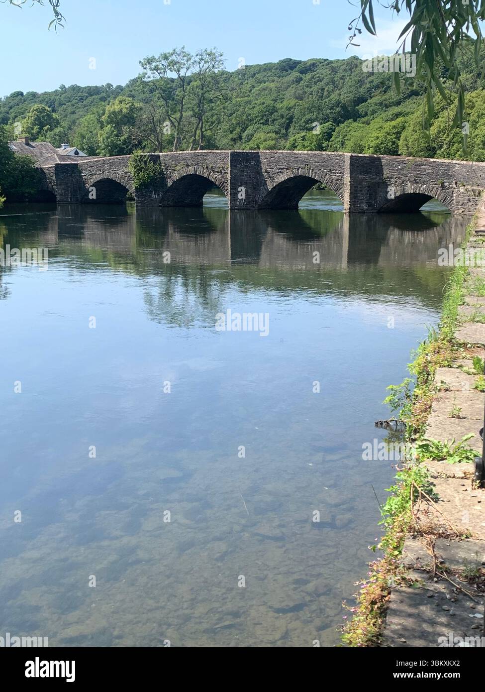 Ulverston Newby Bridge Lakeside lake district Swan Hotel  River Leven Lake Windermere Ambleside water lake sports sport boats boat Cumbria people UK - Smartphone Captured Stock Image