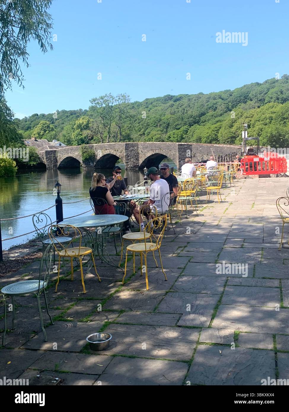 Ulverston Newby Bridge Lakeside lake district Swan Hotel  River Leven Lake Windermere Ambleside water lake sports sport boats boat Cumbria people UK - Smartphone Captured Stock Image