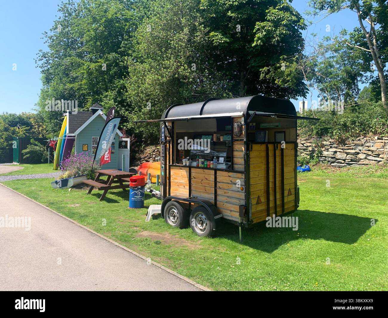 Ulverston Newby Bridge Lakeside lake district Swan Hotel  River Leven Lake Windermere Ambleside water lake sports sport boats boat Cumbria people UK - Smartphone Captured Stock Image