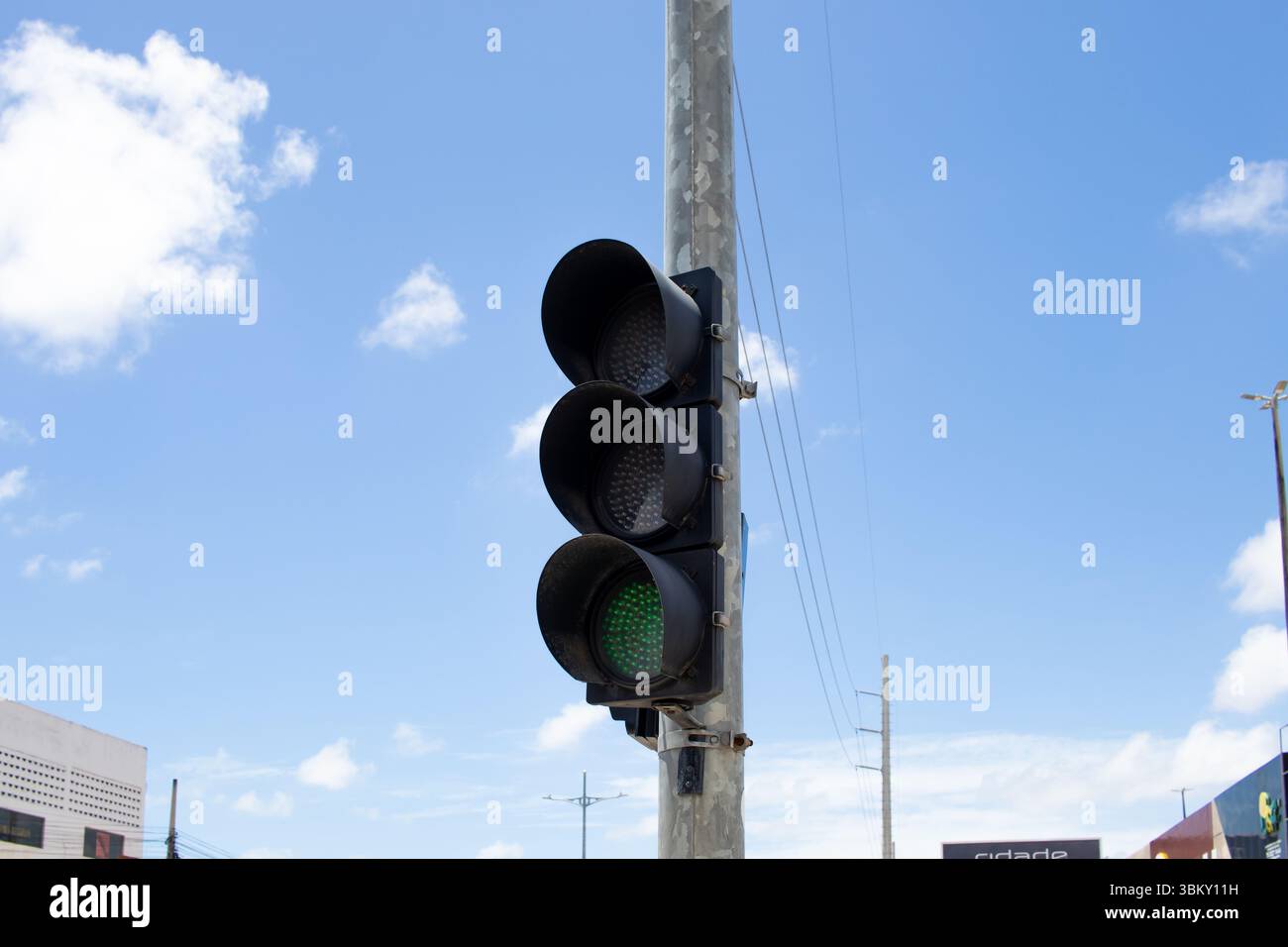 Green traffic light indicating free passage Stock Photo