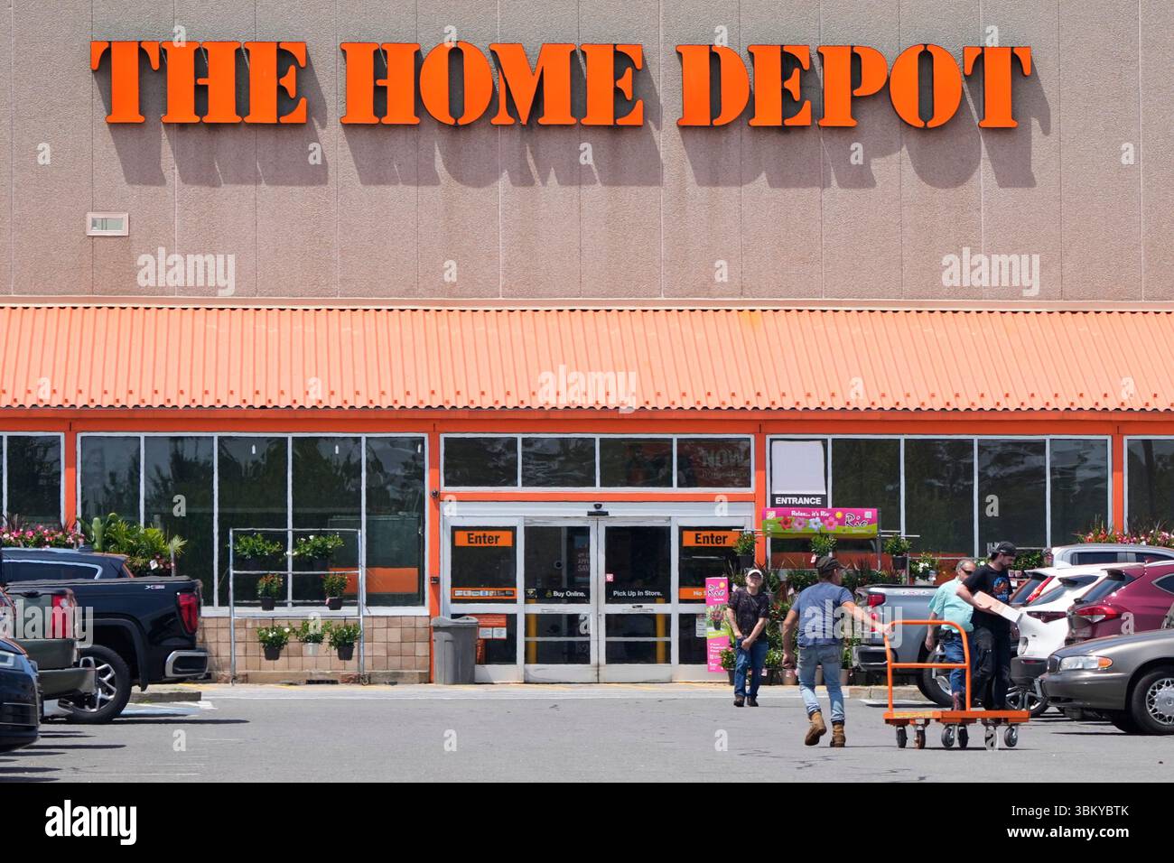 Shoppers outside a Home Depot store, Monday, June 23, 2025, in Plaistow ...