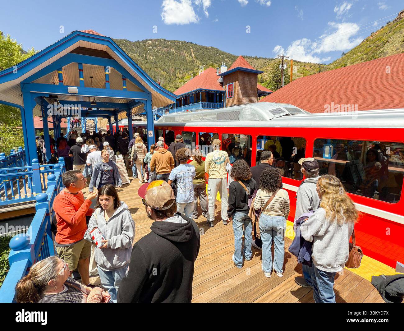 Manitou Springs, Colorado, USA - 21 May 2025: People catching a train on the Manitou and Pike's Peak Cog railway at the base railway station - Smartphone Captured Stock Image