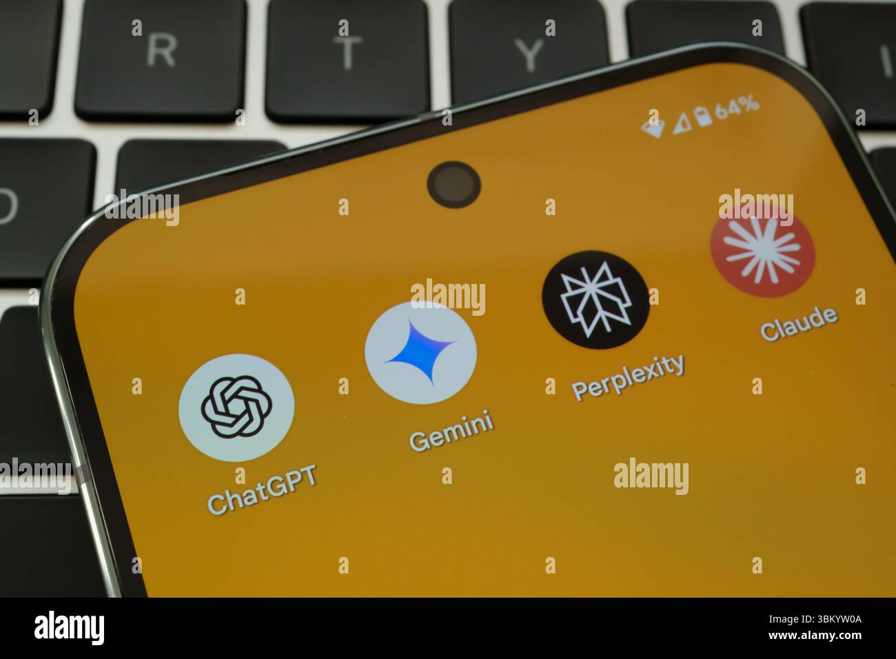 ChatGPT, Gemini, Perplexity, and Claude AI apps visible on smartphone with  yellow background over keyboard. Stafford, United Kingdom, June 23, 2025  Stock Photo - Alamy