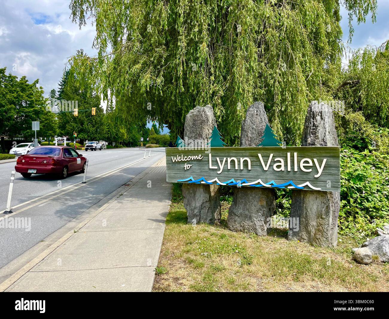 Welcome to Lynn Valley sign, Lynn Valley, North Vancouver, BC, Canada - Smartphone Captured Stock Image