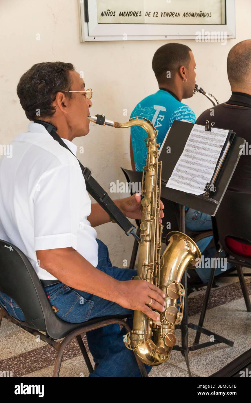 Cuba, Havana. Street musicians, small ensemble, play local Cuban music ...