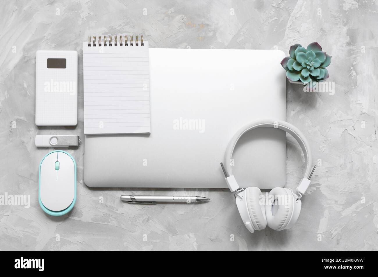 Modern gadgets with notebook on grunge background Stock Photo