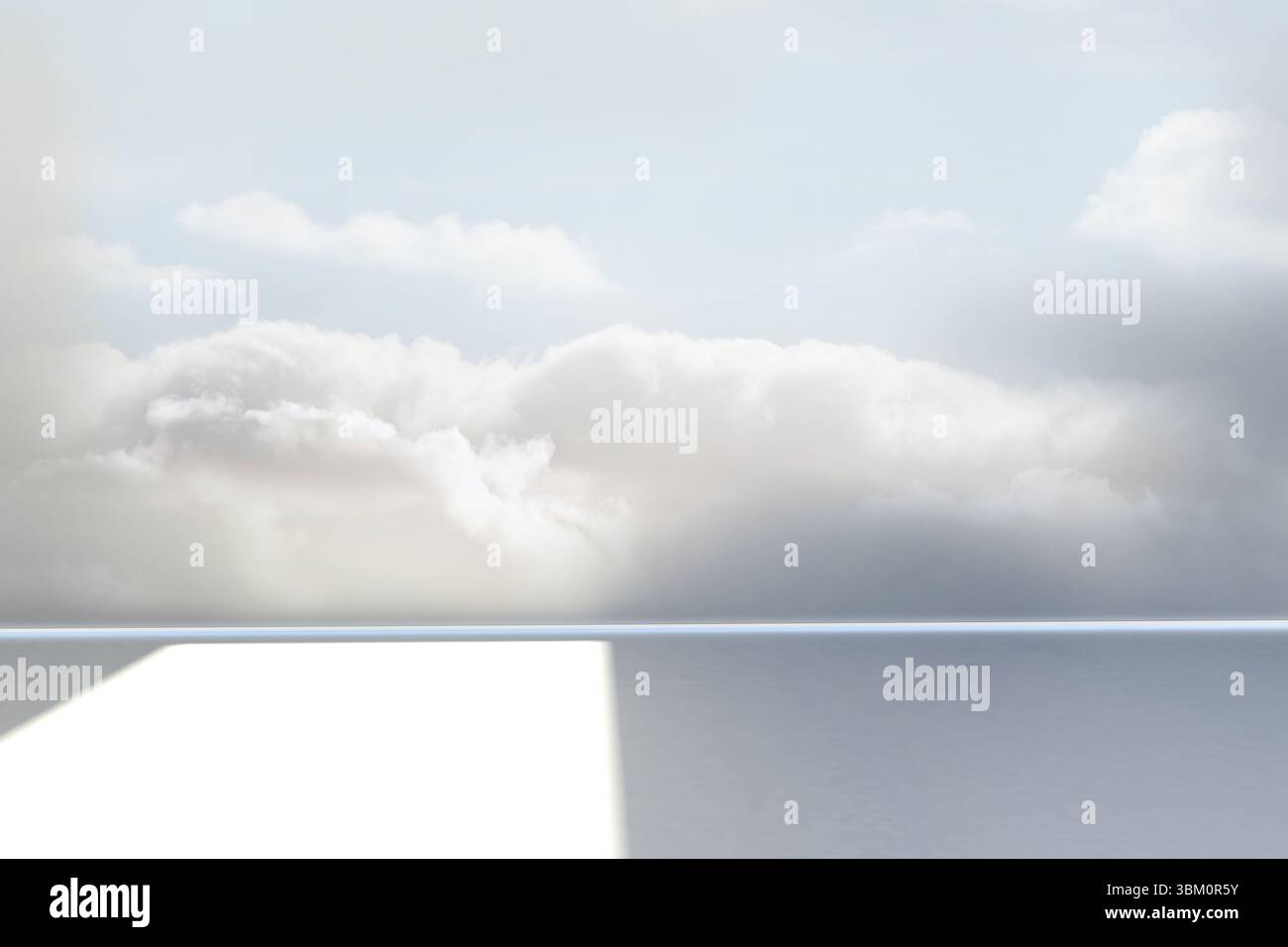 Bright rectangular light patch is reflecting on smooth grey floor under ...