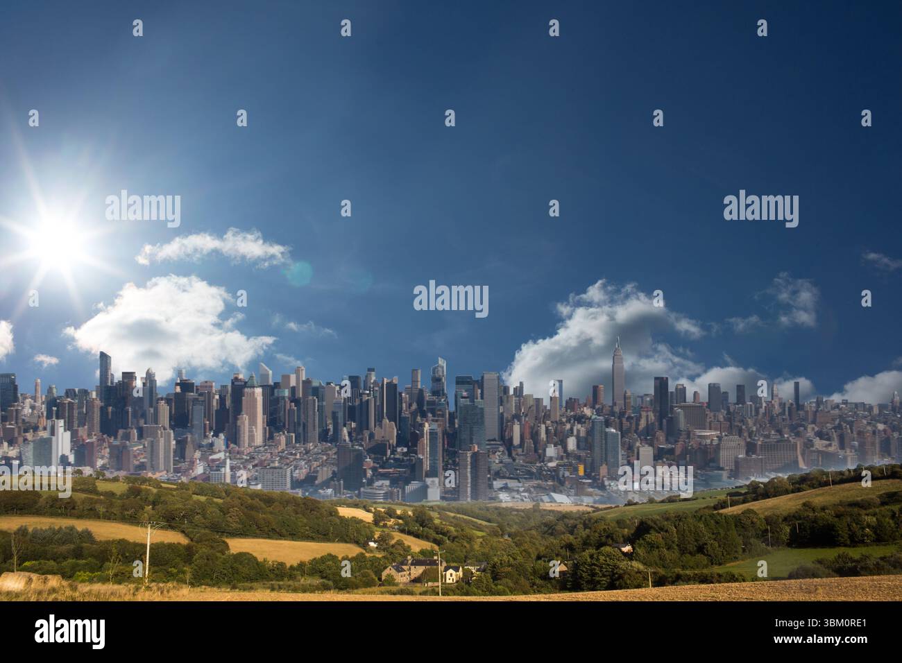 Flat design city skyline merging into rolling green fields with farmhouses, trees under shining sun Stock Photo