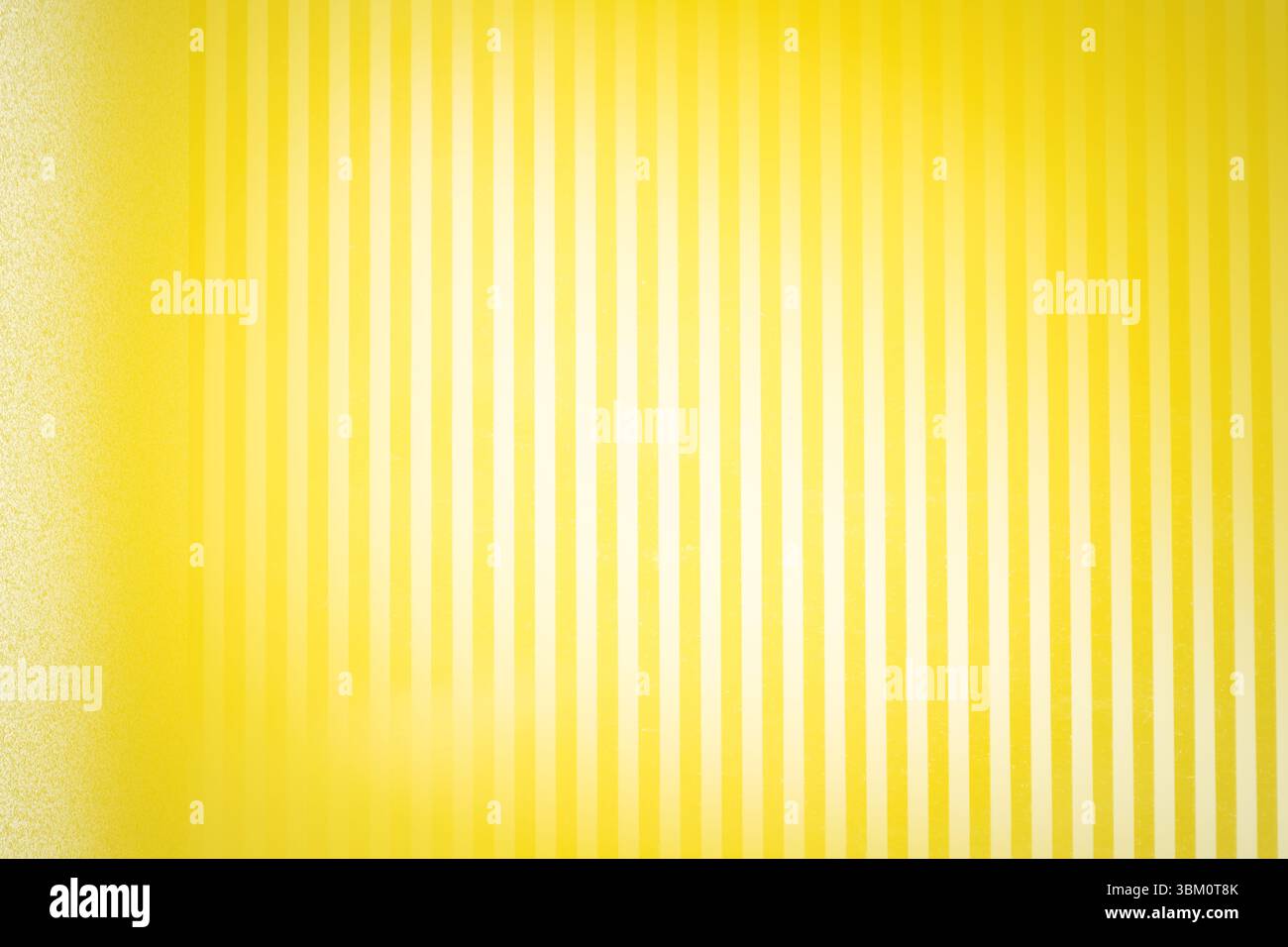 Alternate yellow and off-white bands are creating rhythmic flat design pattern with subtle gradient Stock Photo