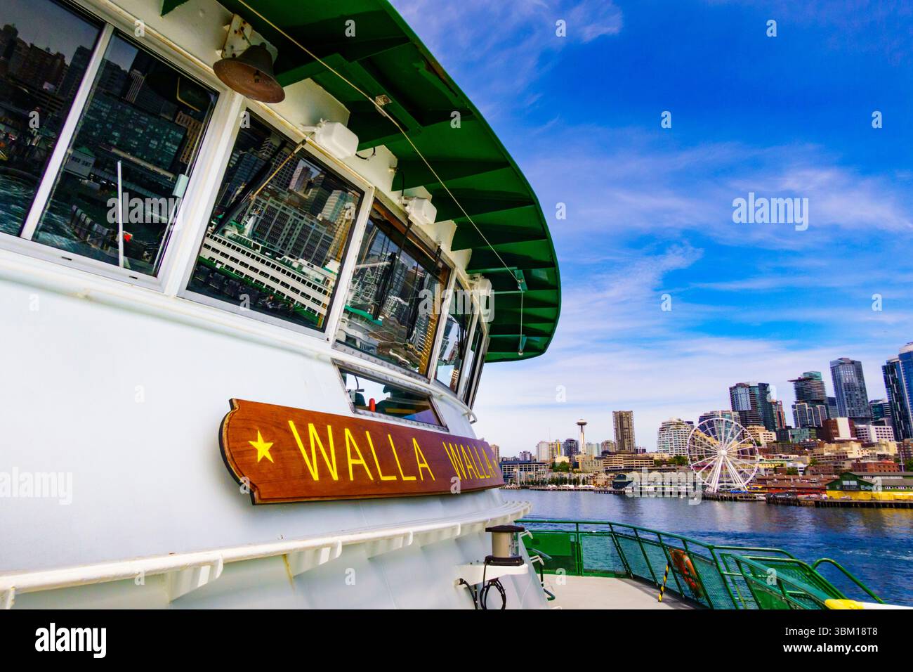 Walla Walla ferry in downtown Seattle with Big Wheel and Space Needle in background, Washington State, USA. Stock Photo