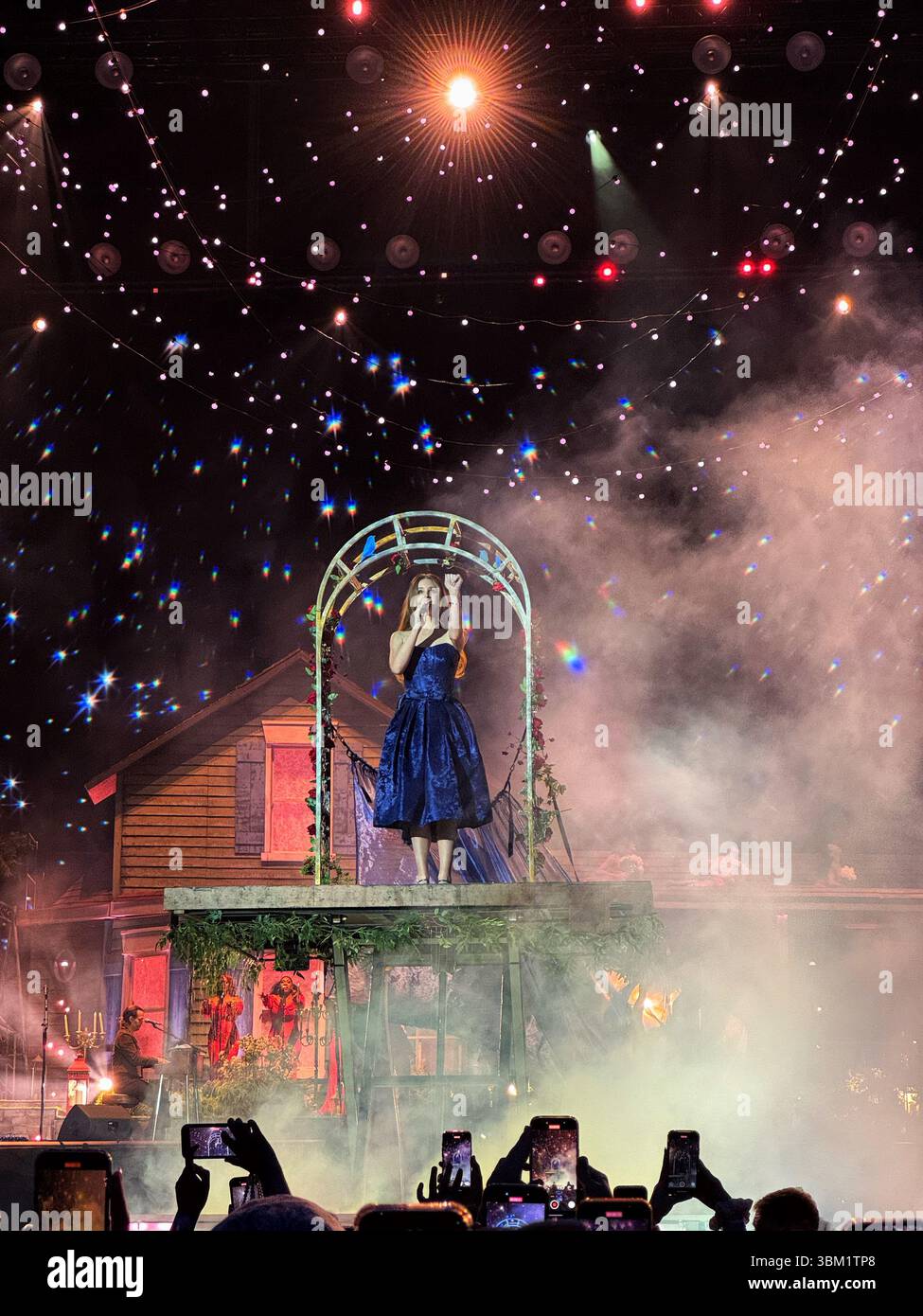 Lana Del Rey live in concert at Cardiff Principality stadium on 23rd June 2025. This was the Young and Beautiful song from the Great Gatsby film. - Smartphone Captured Stock Image
