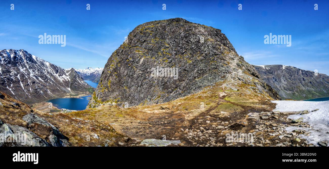 Panoramic view of the final summit ascent of Knutshoe a challenging ridge walk in the Jotunheimen National Park Norway above lake Gjende Stock Photo