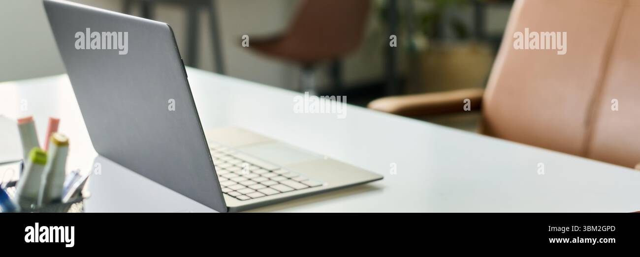 Modern Laptop on Desk Representing Neural Network Development Workspace Stock Photo