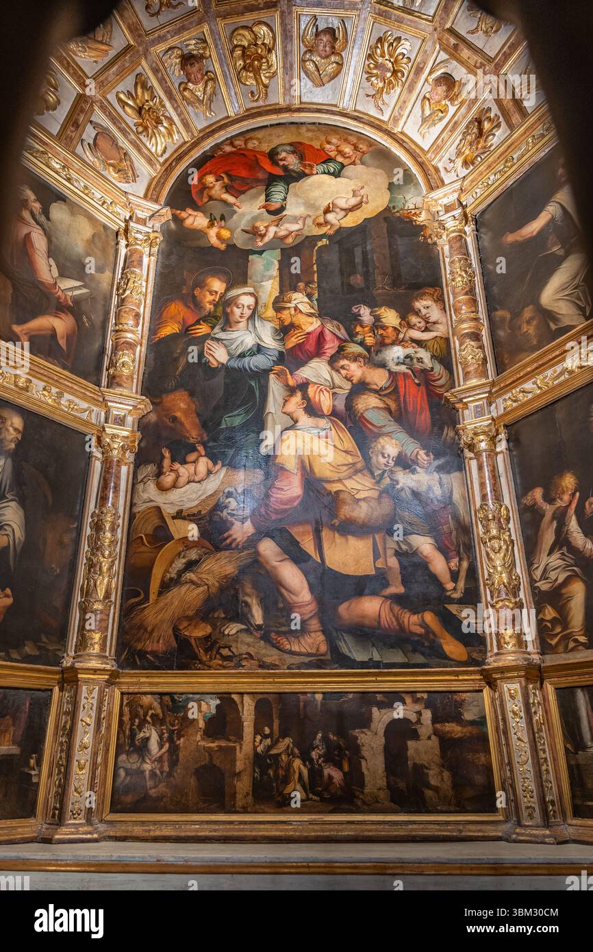 Worship of the Shepherds painting from 1555 by Luis de Vargas in Altyar of the Nativity in Seville Cathedral (Catedral de Sevilla) interior in Seville Stock Photo