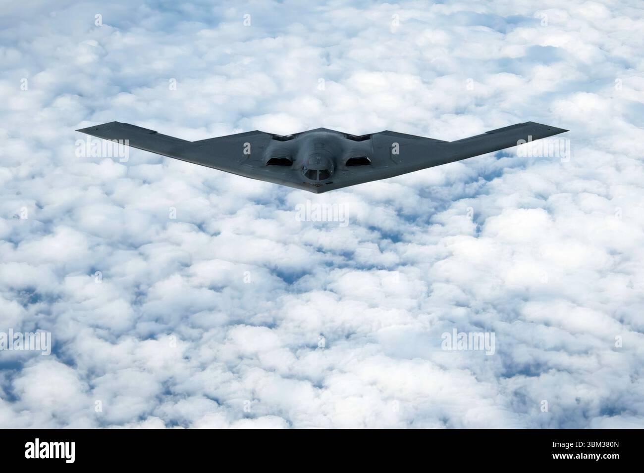 USAF B-2 Spirit stealth bomber flying above the clouds in the Indo-Pacific area on September 10, 2024. Stock Photo