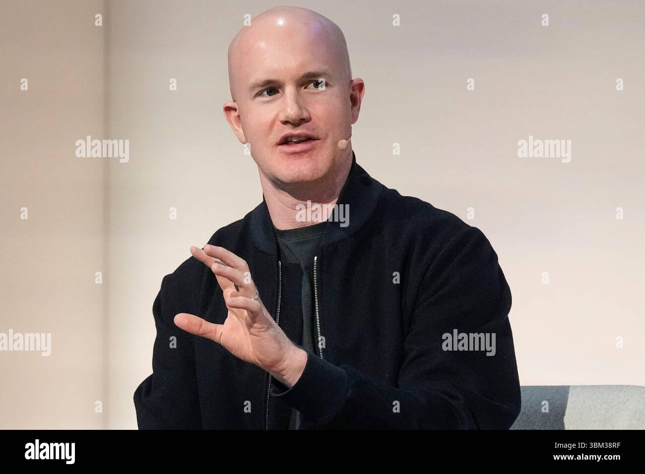 FILE - Brian Armstrong, Co-founder and CEO of Coinbase, participates in the  State of Crypto Summit, in New York, June 12, 2025. (AP Photo/Richard Drew,  File Stock Photo - Alamy