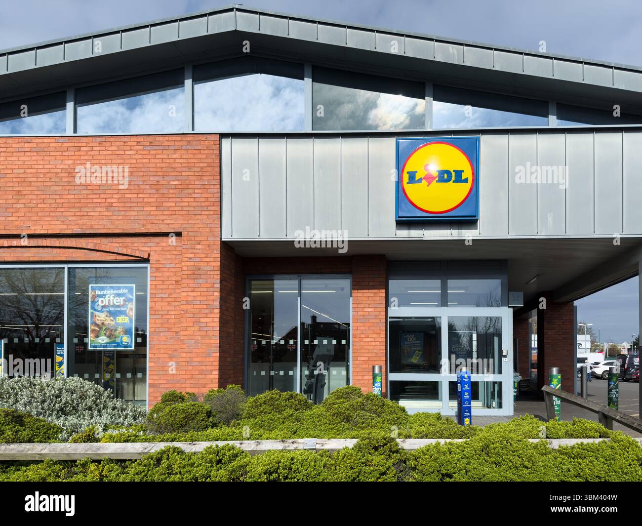 Shrewsbury, England, UK - March 31, 2025; Entrance with brand sign to Lidl store in England Stock Photo