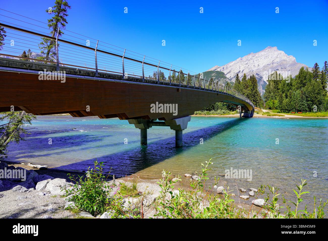 Banff Pedestrian Bridge crossing the Bow River in the Banff National ...