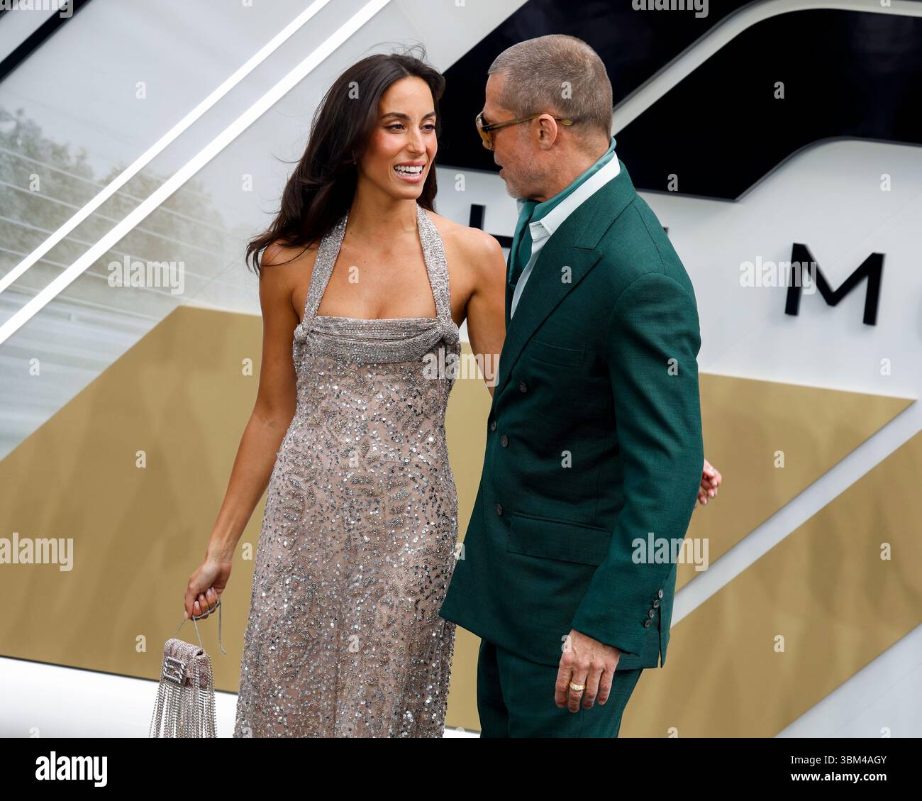 Ines de Ramon and Brad Pitt attend the F1: The Movie European Premiere