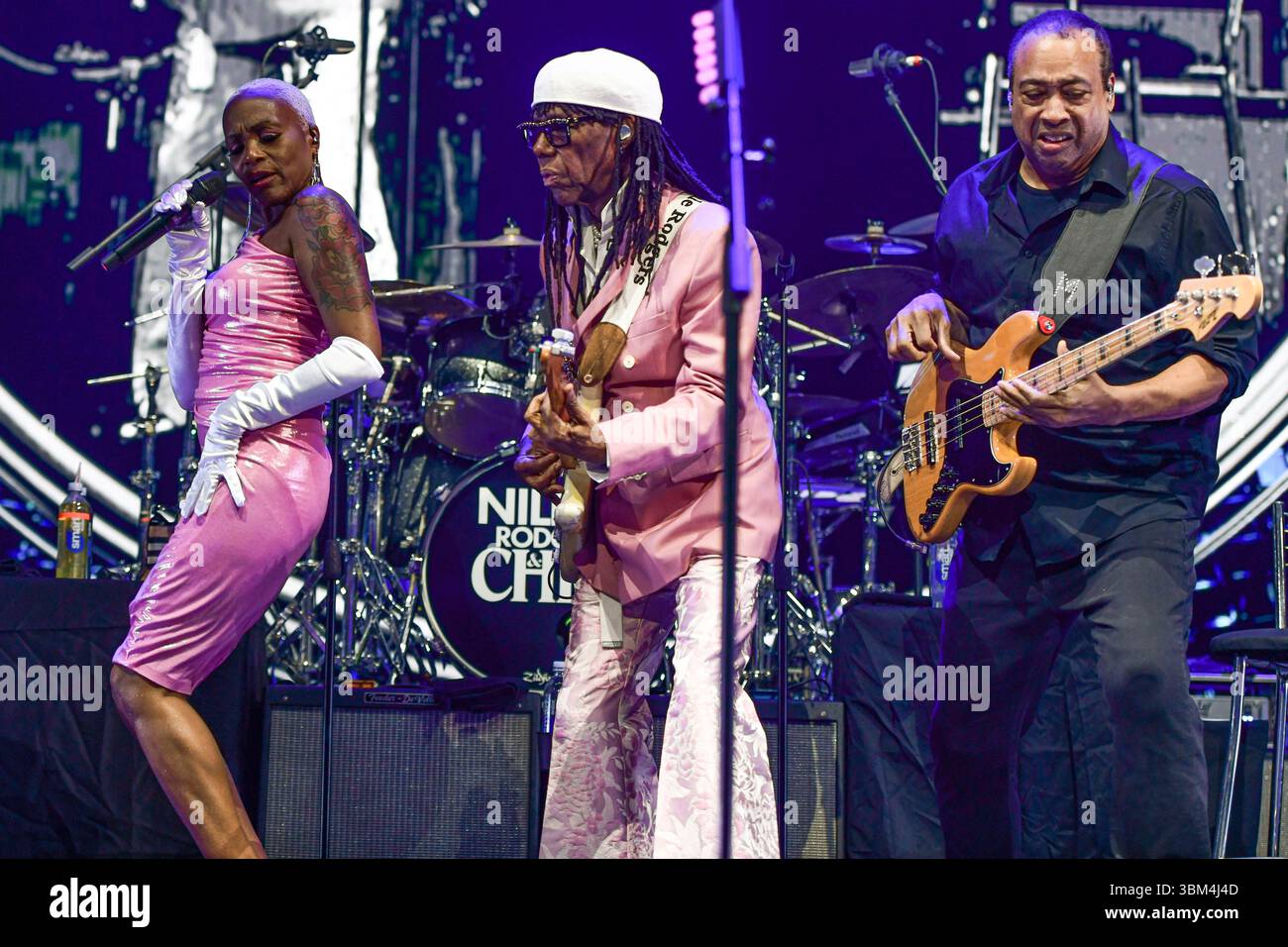 Nile Rodgers & Chic (Nile Rogers, guitar, Kimberly Davis, vocals, Jerry Barnes, bass). Live concert in Movistar Arena (Argentina). Stock Photo
