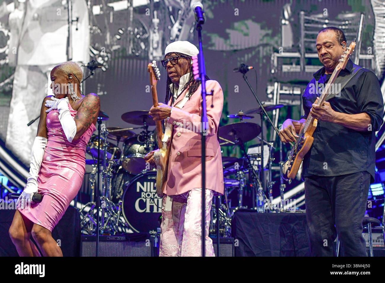 Nile Rodgers & Chic (Nile Rogers, guitar, Kimberly Davis, vocals, Jerry Barnes, bass). Live concert in Movistar Arena (Argentina). Stock Photo