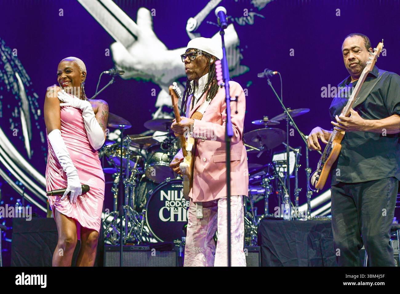 Nile Rodgers & Chic (Nile Rogers, guitar, Kimberly Davis, vocals, Jerry Barnes, bass). Live concert in Movistar Arena (Argentina). Stock Photo