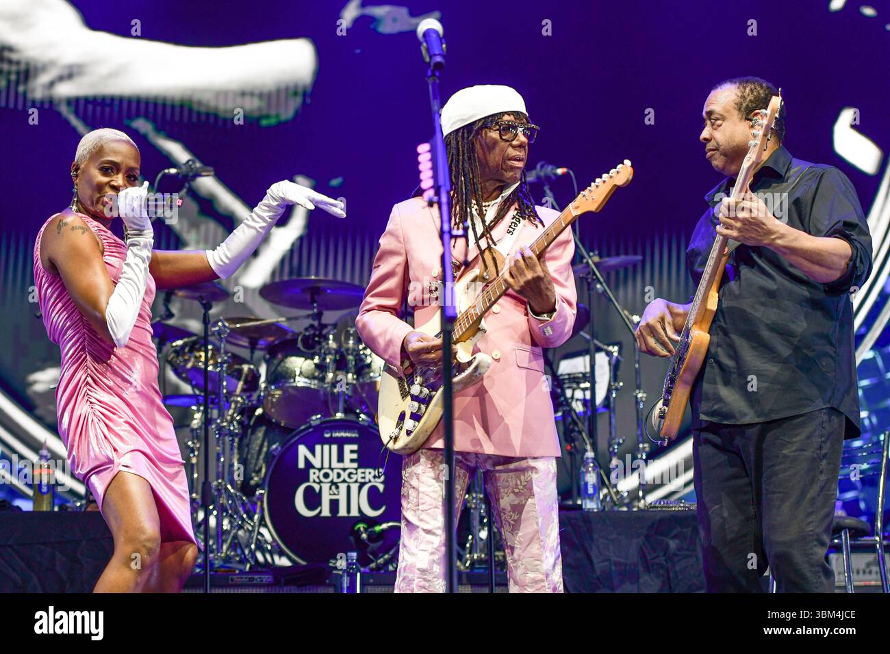 Nile Rodgers & Chic (Nile Rogers, guitar, Kimberly Davis, vocals, Jerry Barnes, bass). Live concert in Movistar Arena (Argentina). Stock Photo