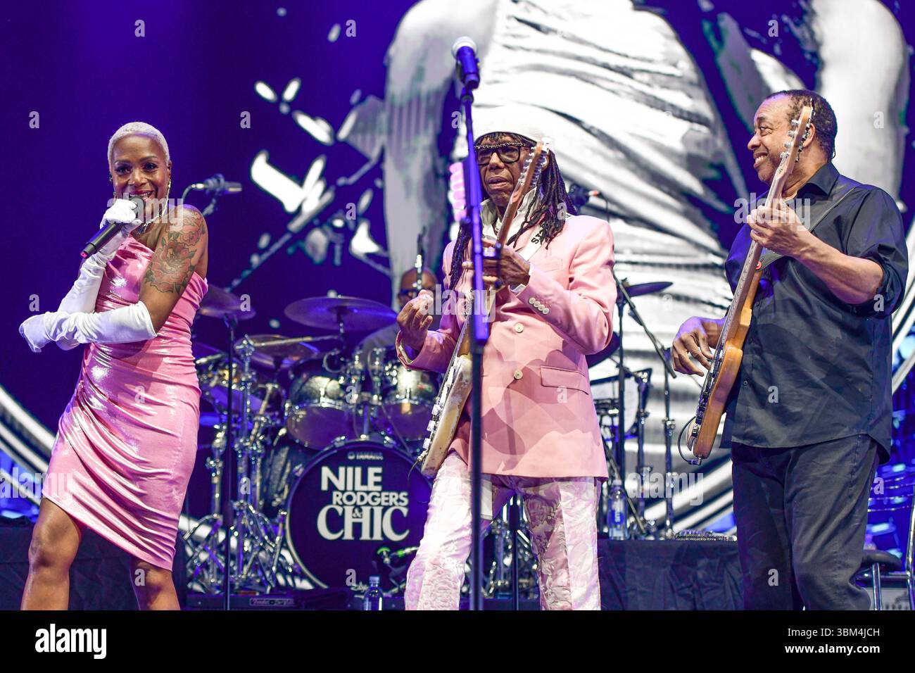 Nile Rodgers & Chic (Nile Rogers, guitar, Kimberly Davis, vocals, Jerry Barnes, bass). Live concert in Movistar Arena (Argentina). Stock Photo