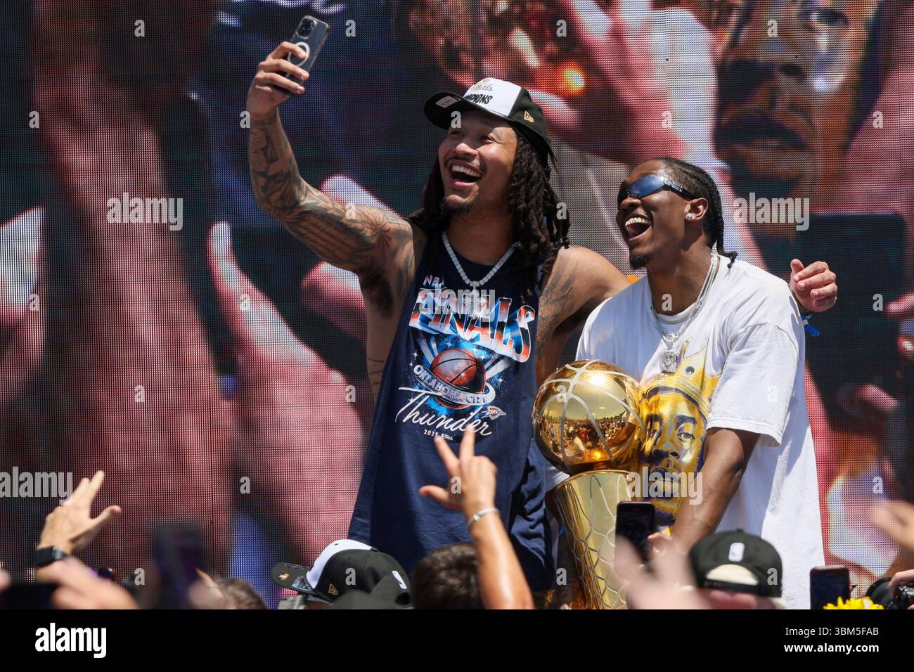 Oklahoma City Thunder forwards Jaylin Williams, left, and Jalen