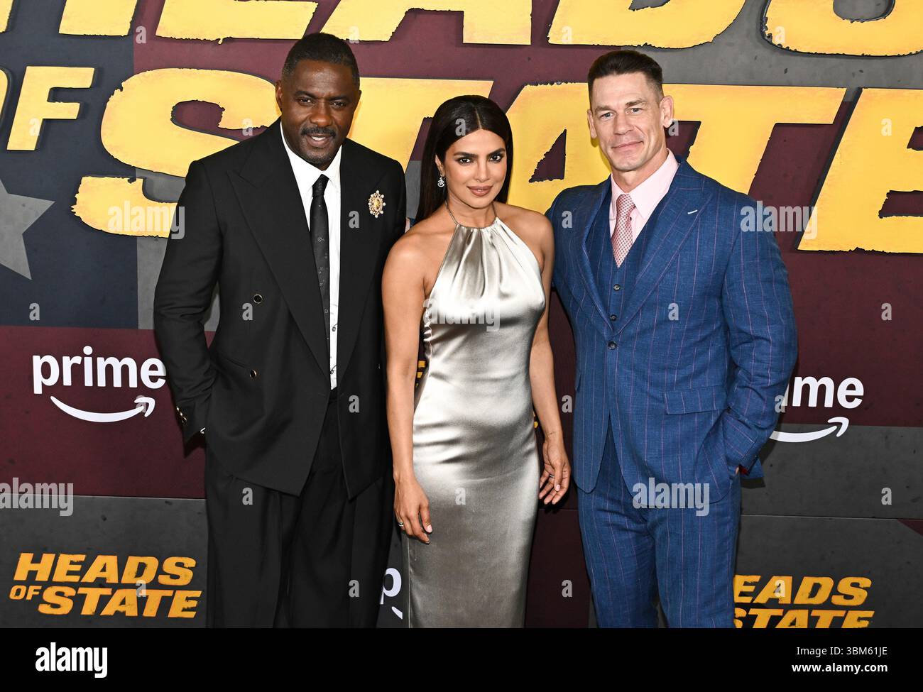 Idris Elba, left, Priyanka Chopra Jonas and John Cena attend the world