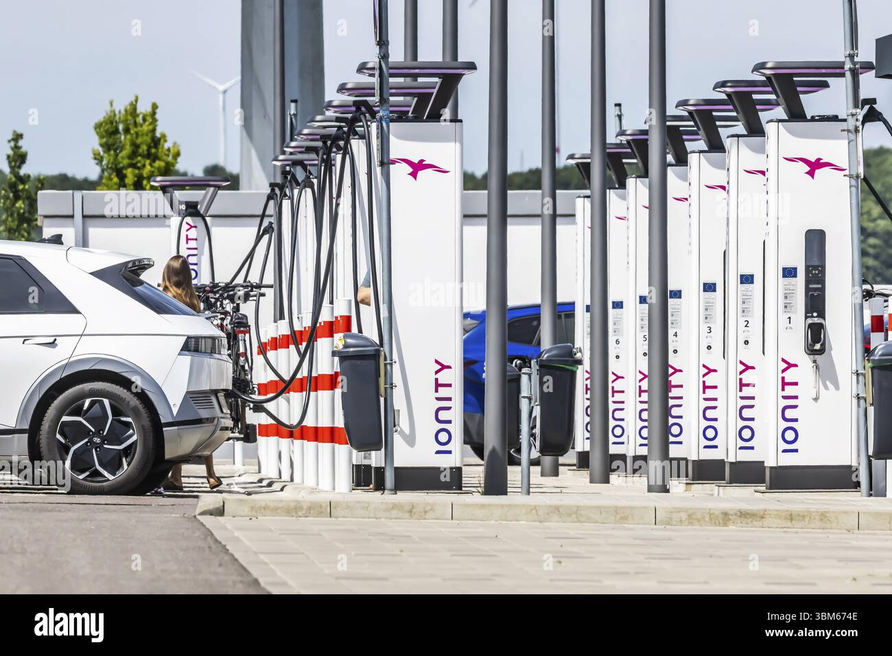 Merklingen charging park in the Swabian Alb. There are charging stations from Ionity and Tesla at the junction of the A8 motorway. Merklingen, Baden-W Stock Photo