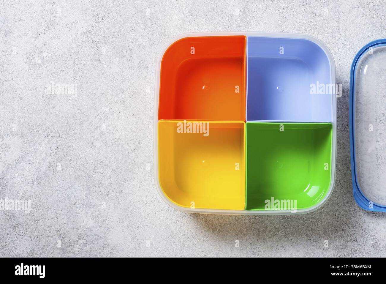 Empty lunch box with four sections for different food Stock Photo