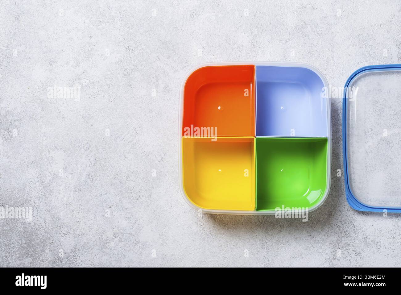 Empty lunch box with four sections for different food Stock Photo