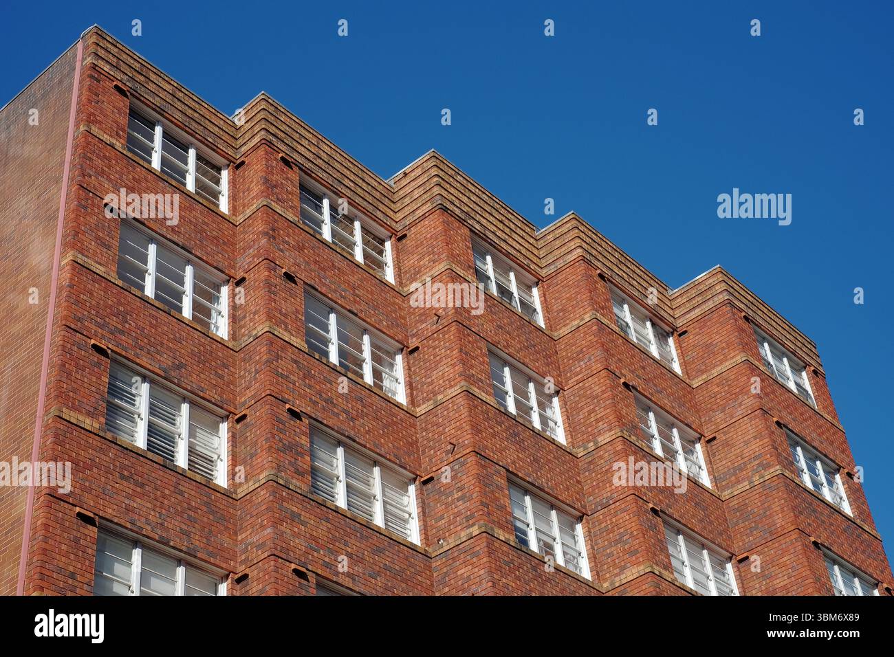 Seventeen Elizabeth Bay Rd upper stories of the Art Deco apartment block, Zigzag brick facade in Elizabeth Bay, Sydney, Australia Stock Photo