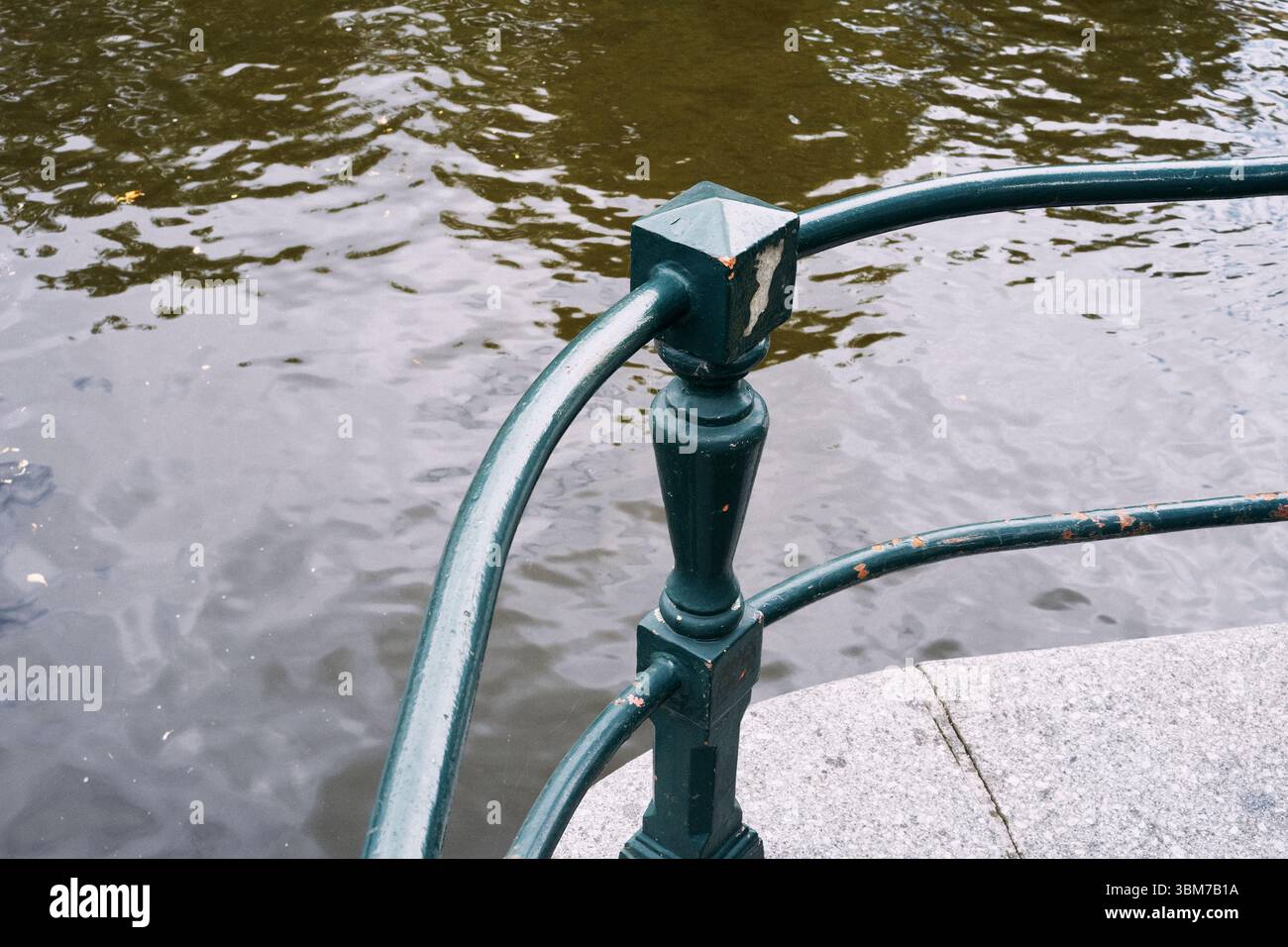 Canal Railing A railing by a canal of Amsterdam Stock Photo - Alamy