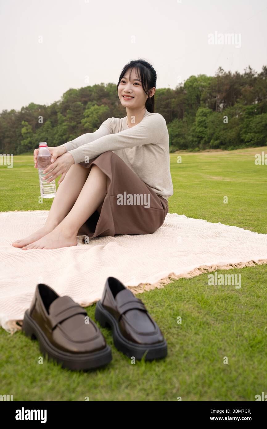 Asian pretty young woman drink hi-res stock photography and images - Alamy