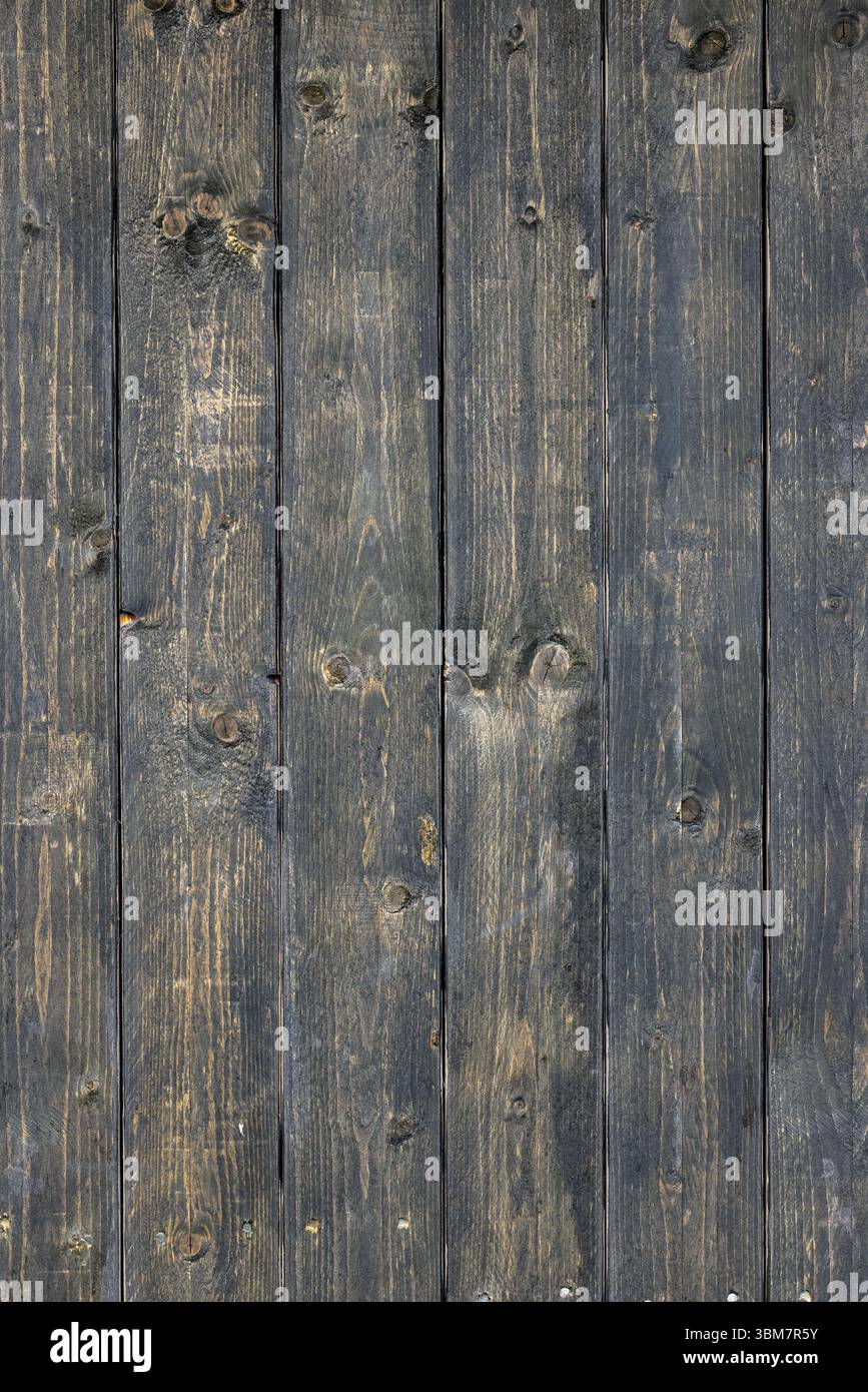 old dark painted wooden wall background Stock Photo