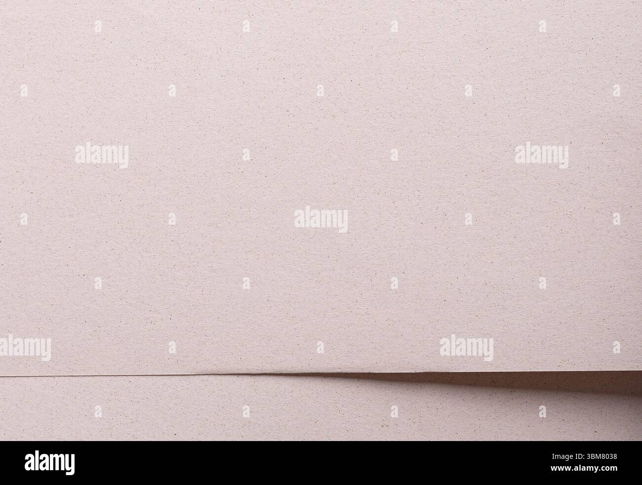 Rustic craft paper with a speckled, mottled texture in earthy brown ...