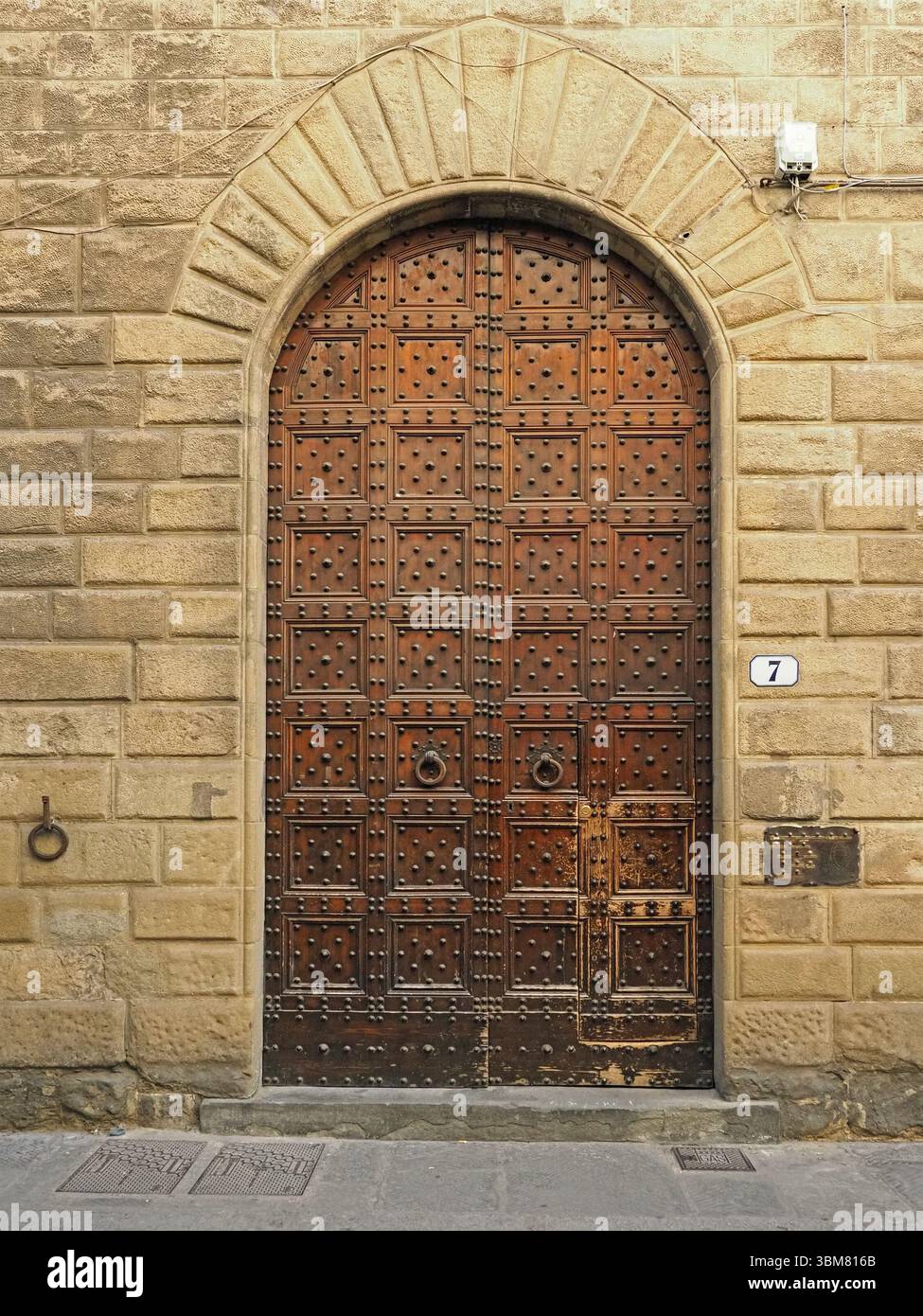 large panelled doorway Florence, Italy Stock Photo