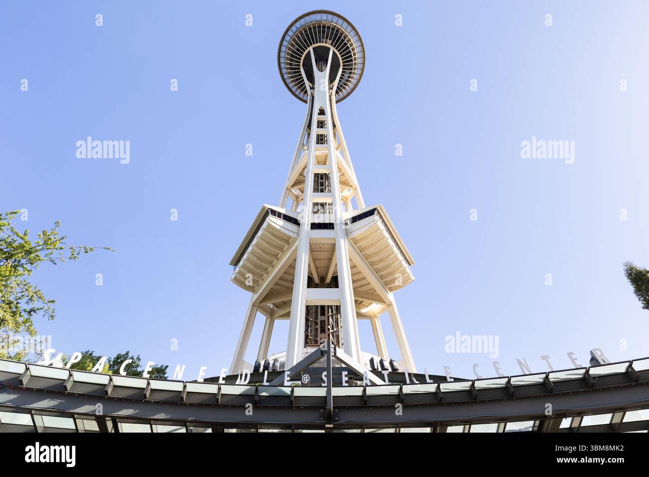 The Space Needle, located in the Lower Queen Anne neighborhood, is the most famous landmark in Seattle that offers amazing views of the entire city. Stock Photo
